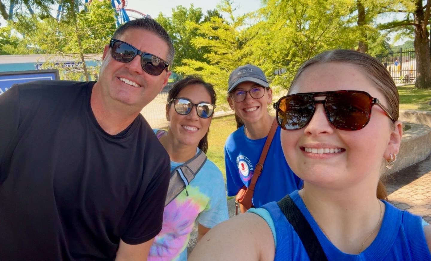 Princeton volleyball coaches Andy Puck (left), Gina Puck, Anna Murray and Libby Boyles accompanied 16 players to their annual team-bonding day at Great America on Thursday.