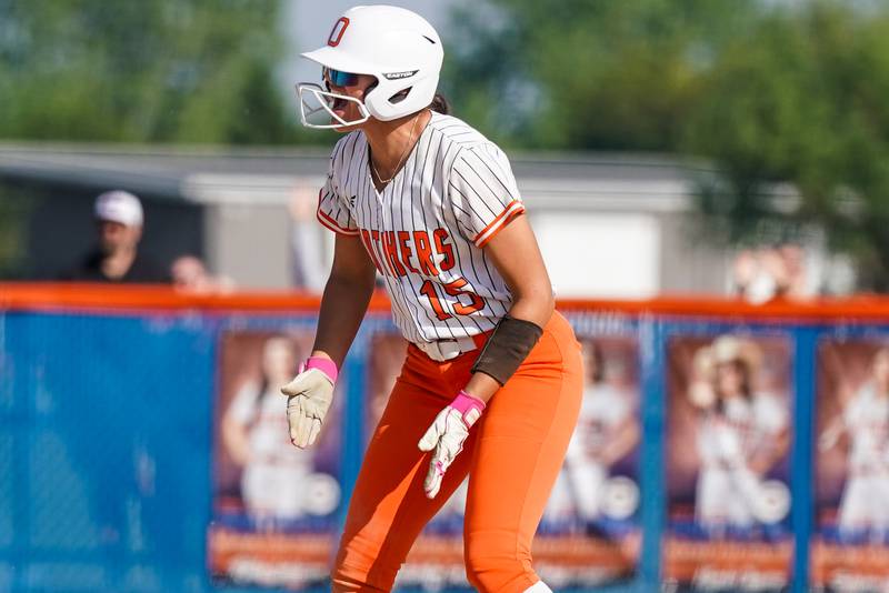 Oswego’s Sabrina Zamora (15) reacts after hitting a two-run double against Wheaton North during a Class 4A Oswego Sectional Final game at Oswego High School on Friday, June 6, 2025.