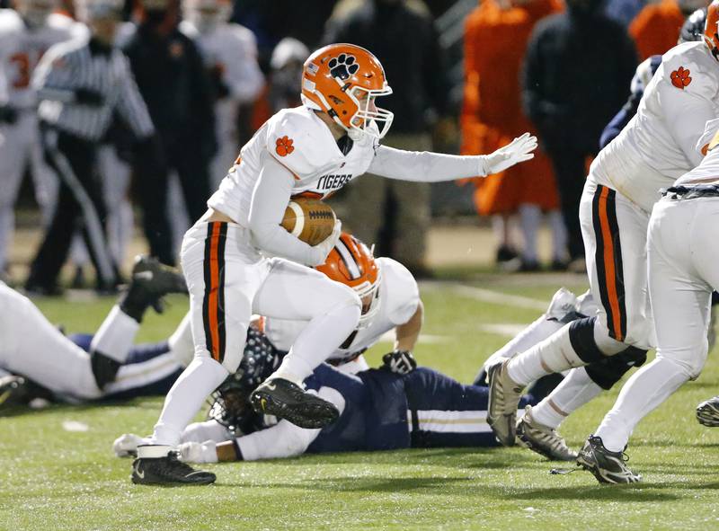 Byron's Everett Wichman (25) runs the ball during the Class 3A varsity football semi-final playoff game between Byron High School and IC Catholic Prep on Saturday, Nov. 19, 2022 in Elmhurst, IL.