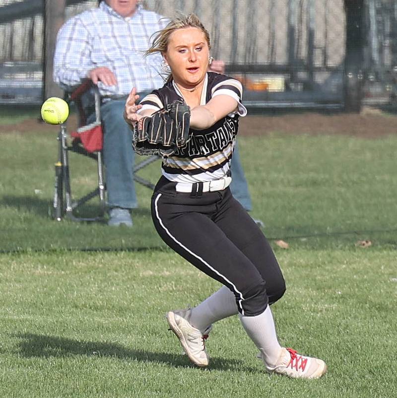 Sycamore's Addison McLaughlin tries to corral a bad hop during their game against LaSalle-Peru Tuesday, April 11, 2023, at Sycamore High School.