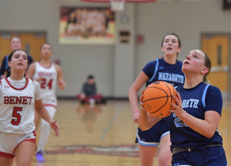 Nazareth’s Lyla Shelton (right) takes the ball to the basket after a full court fast break during a game against Benet on January 28, 2026 at Benet Academy in Lisle.