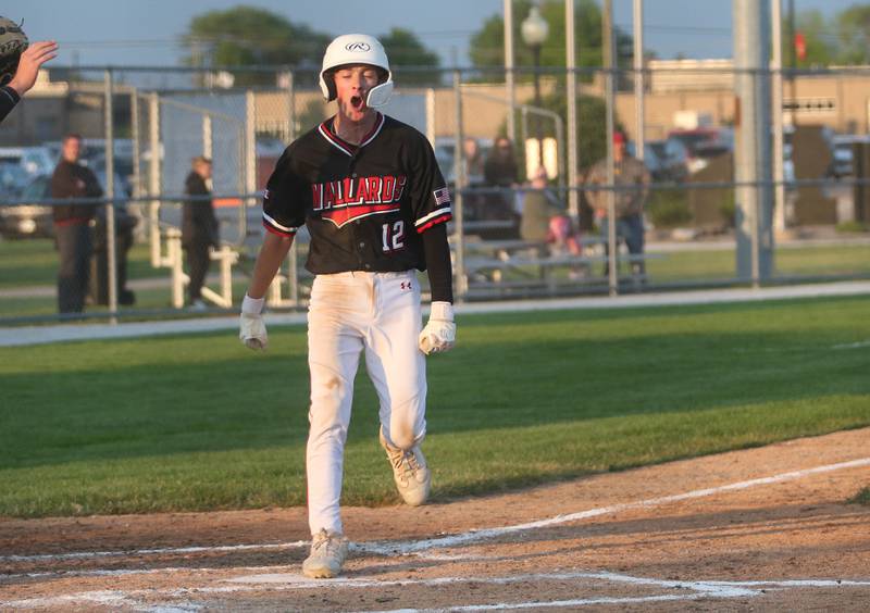 Henry-Senachwine's Caleb Wiesbrock reacts after stepping on home plate to score the teams only run against Lexington during the Class 1A Sectional semifinal game on Wednesday, May 28, 2025 at Schwieckert Stadium in Peru.
