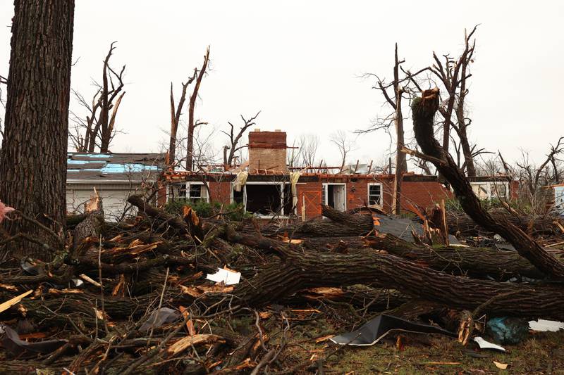 Damage is seen along Elmwood Drive in Aroma Park  on March 11, 2026 following a March 10 tornado that passed through Kankakee County.