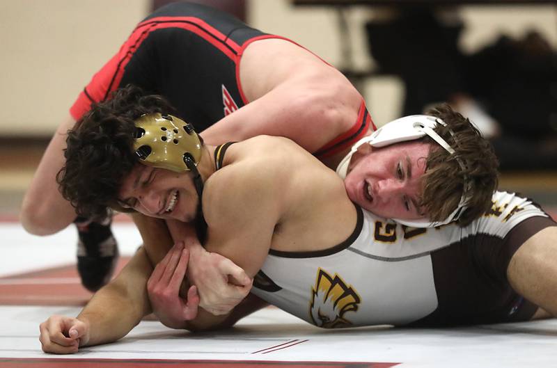 Huntley’s Griffin Guenther controls Jacobs’ Andrew Vormittag during the 138—pound match of a Fox Valley Conference wrestling meet on Thursday, Dec. 11, 2025, at Huntley High School.