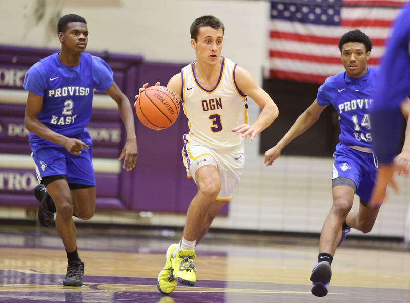 DGN's Ethan Thulin (3) brings up the ball during the boys 4A varsity regional final between Downers Grove North and Proviso East in Downers Groves on Friday, Feb. 24, 2023.