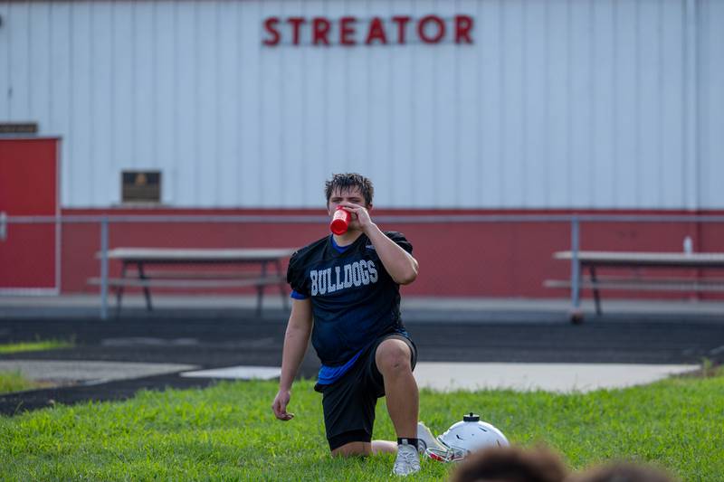 Connor Magana of Streator drinks water during practice on Monday, August 11, 2025 at Streator High School in Streator.