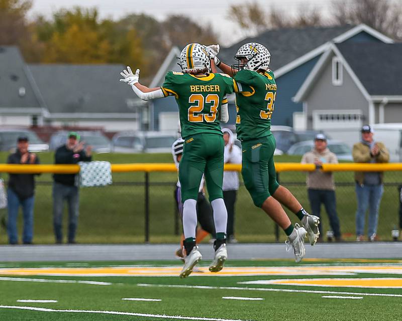 Coal City's Gabriel Mchugh (32) celebrates his touchdown reception with Gavin Berger (23) during Class 4A quarterfinal football game between Dixon at Coal City on Saturday, Nov 16, 2024  in Coal City.