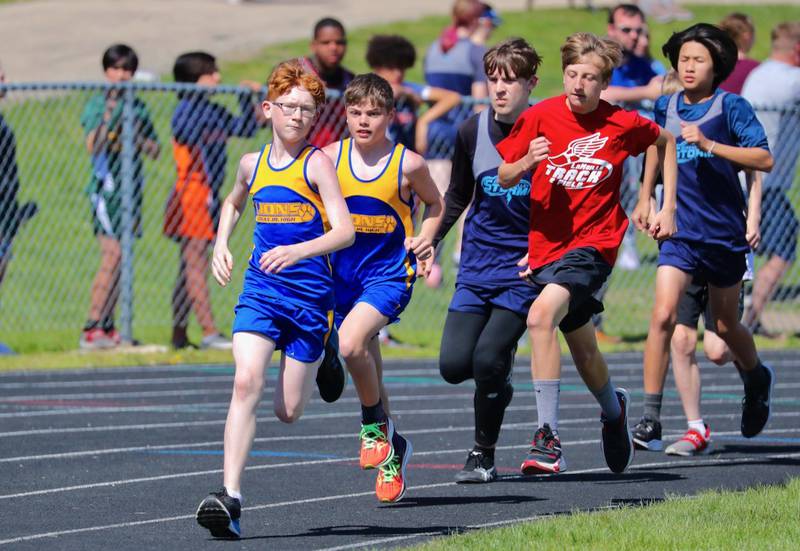 Princeton Logan's Parker Nink and Ethan Mallory pace the pack in the 1600 meters in Bureau County Junior High School track meet.