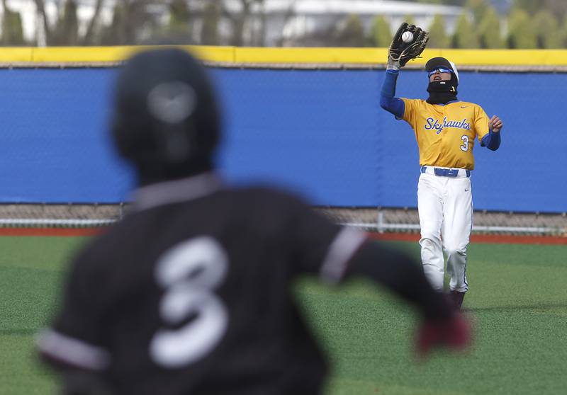 Marengo's Max Broughton watches as Johnsburg's Landon Johnson catches his fly ball during a Kishwaukee River Conference baseball game on Monday, April 21, 2025, at Johnsburg High School.