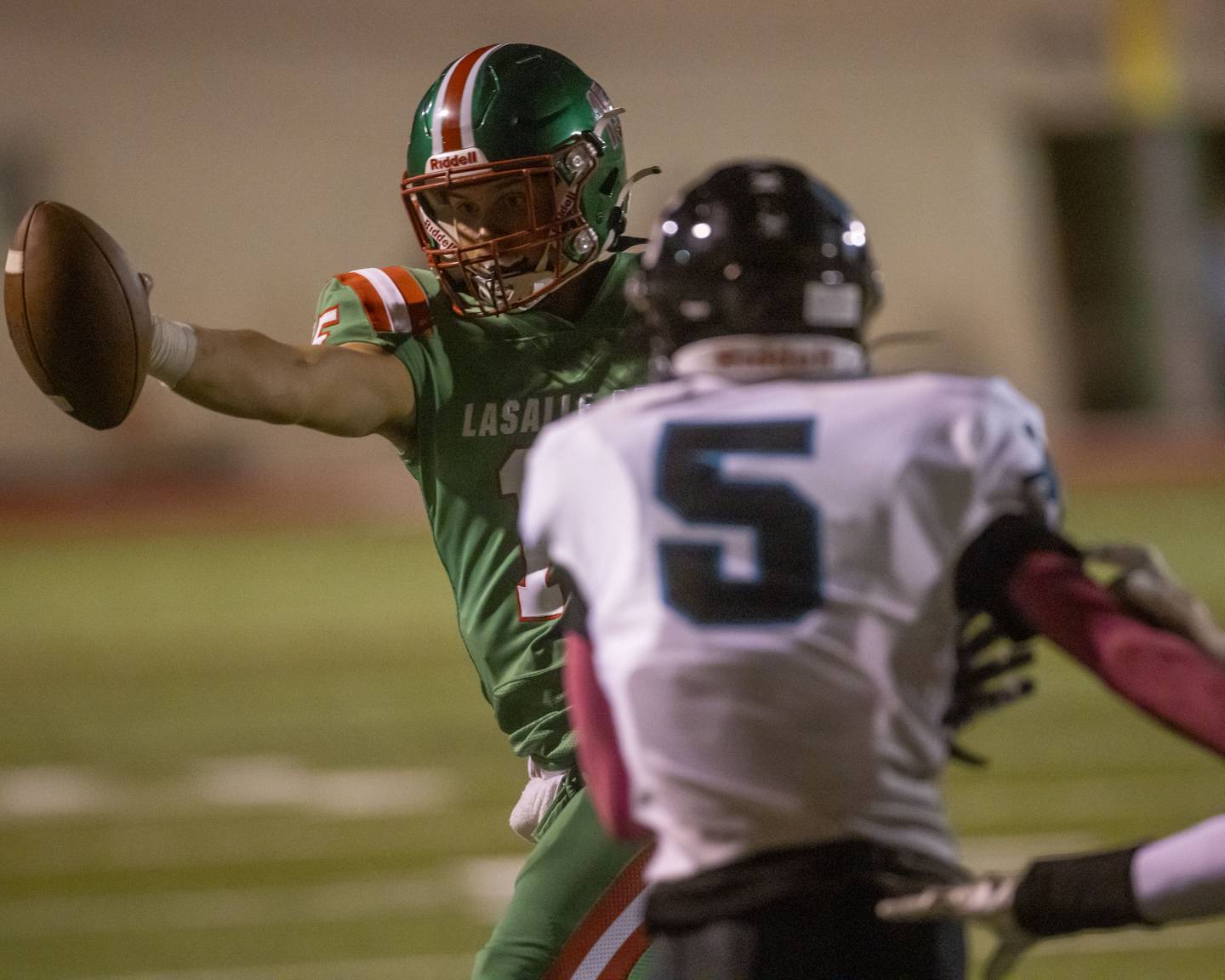 Brendan Boudreau soaks up every last yard while performing a quarterback rush in a game against Woodstock North at Howard Fellows Stadium on Sept. 8, 2023.