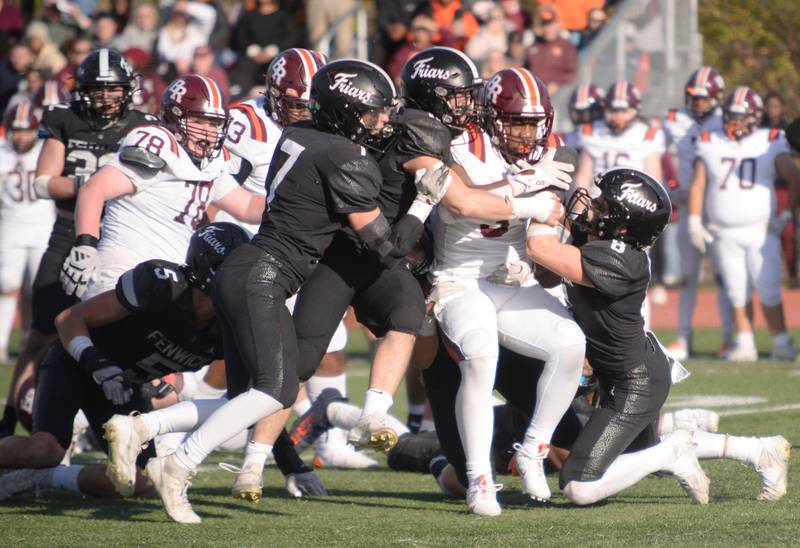 Fenwick's defensive takes down Brother Rice's Tyler Lofton during the playoff game Saturday, Nov. 2, 2024.