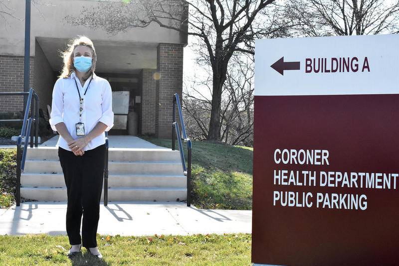 McHenry County Department of Health Public Health Nursing Director Susan Karras poses for a photo Friday outside of the building in Woodstock.