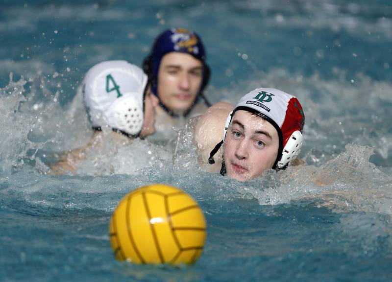 YorkÕs Aiden Reedy (1) keeps his eye on the ball against Lyons during the IHSA State Water Polo consolation match Saturday May 20, 2023 at Stevenson High School in Lincolnshire.