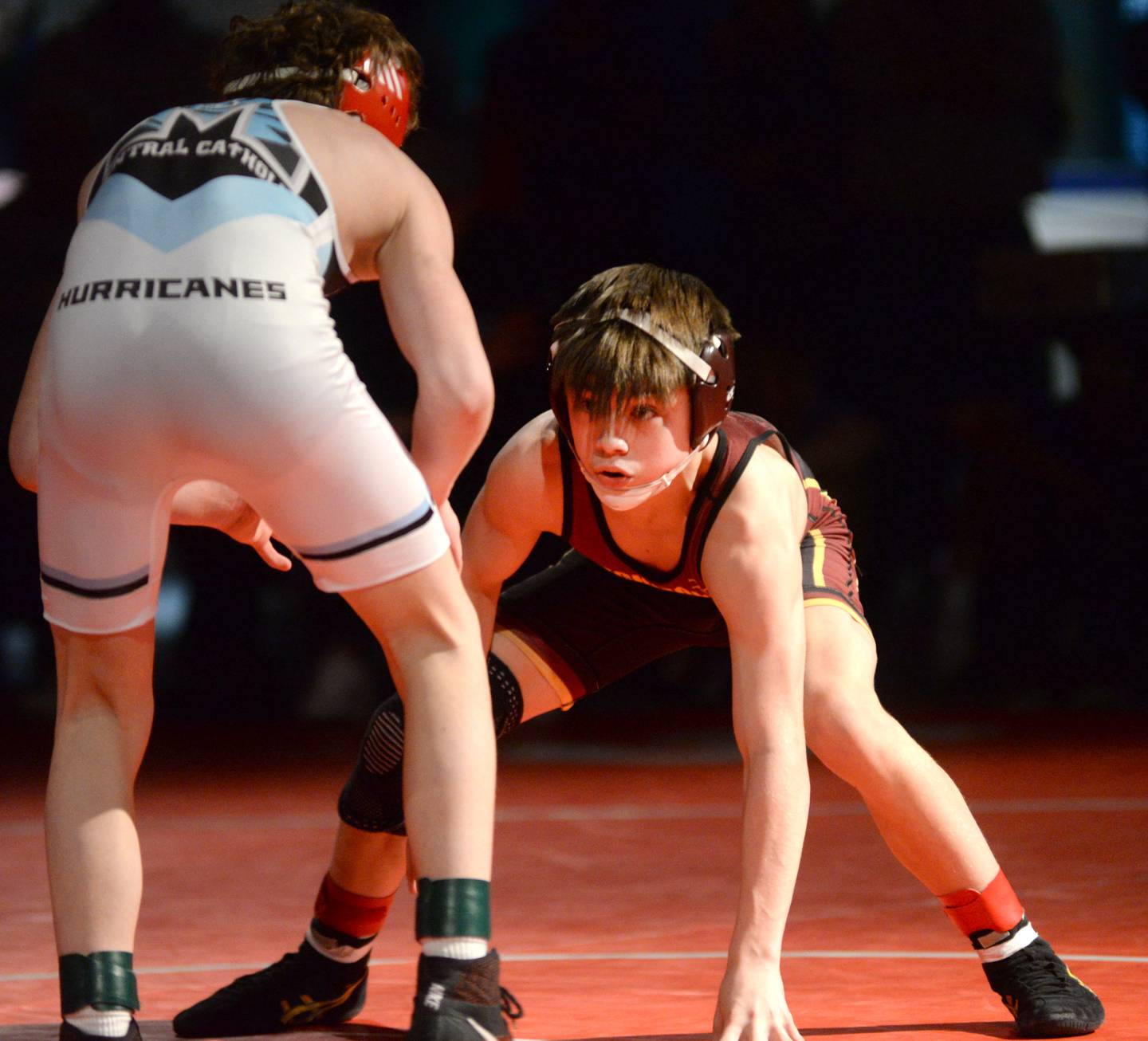Richmond Burton’s Lelan Nelson sets his eyes on Woodstock Marian’s Camden Spinolas at the start of their at 106-pound match in the finals at the 1A Oregon Regional on Saturday, Feb. 15, 2025.