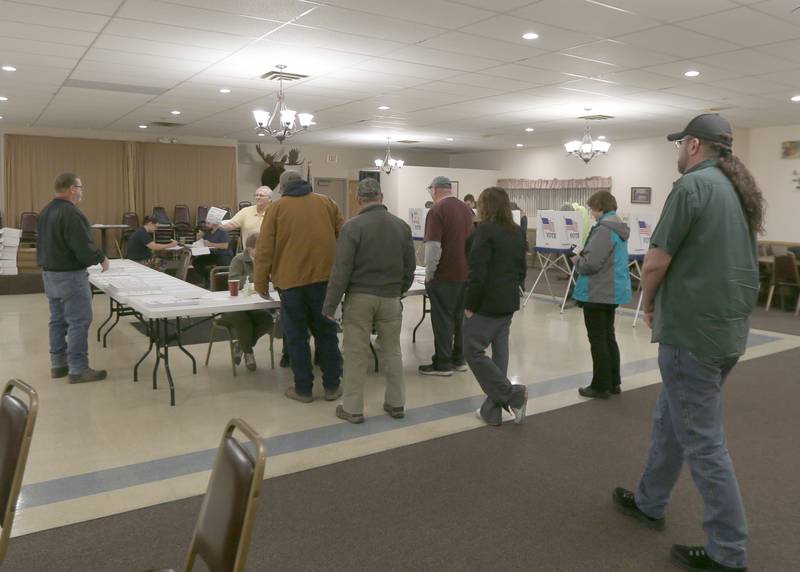 A long line of voters wait to check in to vote at the Moose Lodge on Tuesday, Nov. 8, 2022 in Princeton.