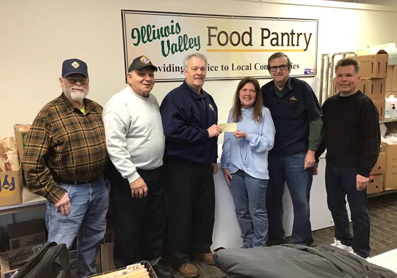 The Utica Father Marquette Council of the Knights of Columbus recently presented a check of $2,000 to the Illinois Valley Food Pantry in La Salle. Pictured at the check presentation were (from left to right) Bill Brown, Jim Polizzi, Chuck Voreis, Mary Jo Credi, Mike Brown and Jay Allen.