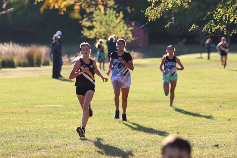 Herscher's Layla Kent nears the finish line ahead of Kankakee's Juliana Gomez, center, and Alison Marin in the girls 3-mile race during All-Area Cross Country meet on Wednesday, Oct. 8, 2025, at Kankakee Community College.