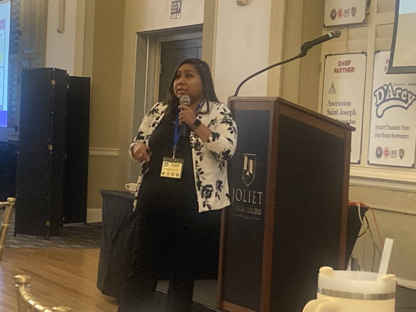 Director of the Joliet Township Community Violence Intervention Services program Keishia Ellis speaks at the Joliet Active Threat & Mental Wellness Conference.