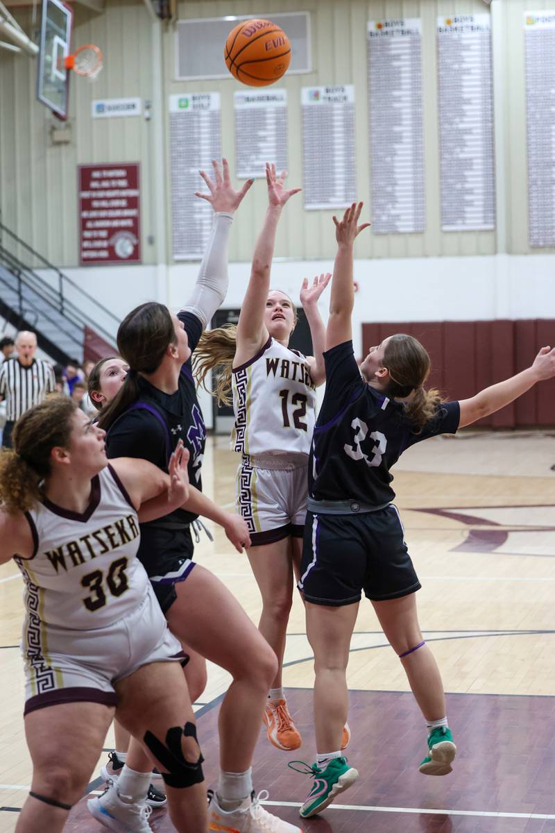 Watseka/Milford's Addissen Ulitzsch shoots under pressure from Manteno's Brooke Blanchette and Maddie Gesky during Manteno's 57-52 victory on Wednesday, Jan. 21, 2026.