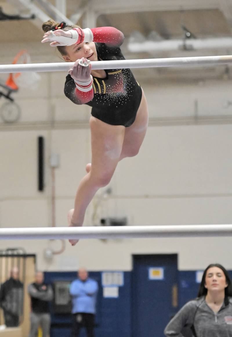 Batavia's Leah Flesch on the uneven bars at the Dukane Conference girls gymnastics regional meet at Lake Park High School in Roselle on Wednesday, Jan. 29, 2025.