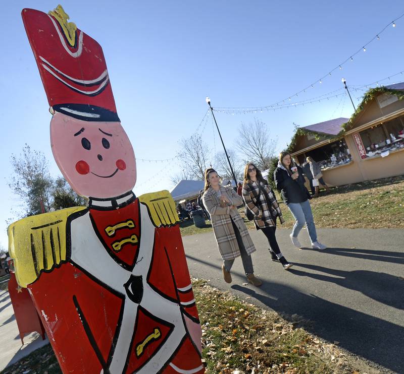 A tin soldier stands ready as shoppers tour the Chris Kringle market Saturday, Nov. 26, 2022, for the first full day of the Chris Kringle Market in Ottawa.