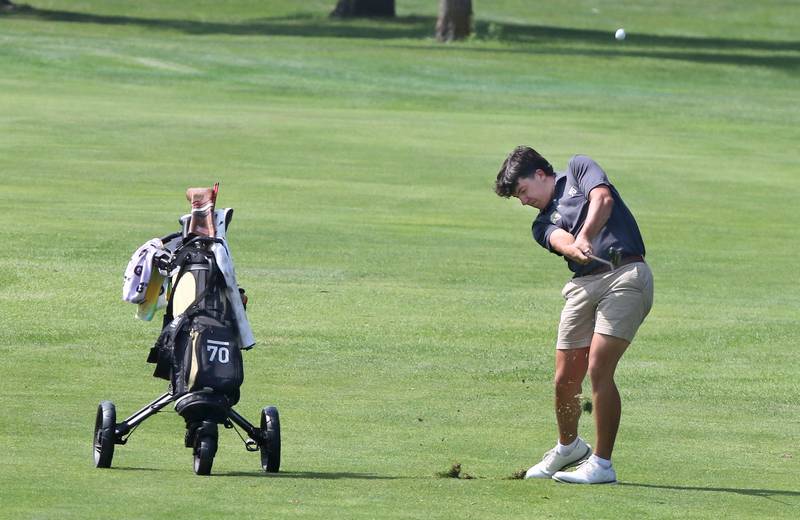 Sycamore’s Luther Swedberg hits his second shot on the eighteenth hole during the Mark Rolfing Cup Monday, Aug. 21, 2023, at the Kishwaukee Country Club in DeKalb.
