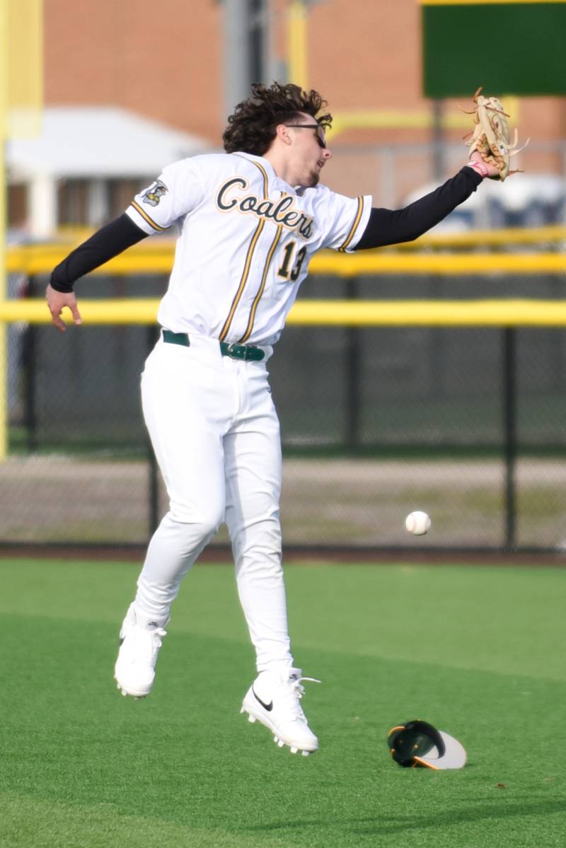 Coal City's Hayden Clark looks for the ball after it got past him during a leaping catch attempt during a home game against Bishop McNamara Thursday, April 3, 2025.