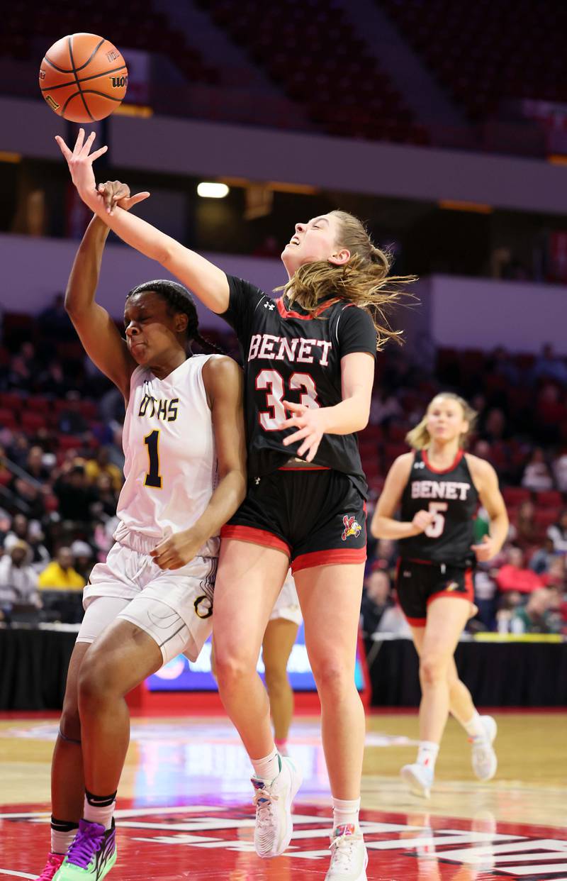 Benet Academy's Magdalena Sularski (33) is fouled on her way to the hoop by O'Fallon's Jailah Pelly (1) during the IHSA Class 4A girls basketball championship game at the CEFCU Arena on the campus of Illinois State University Saturday March 4, 2023 in Normal.
