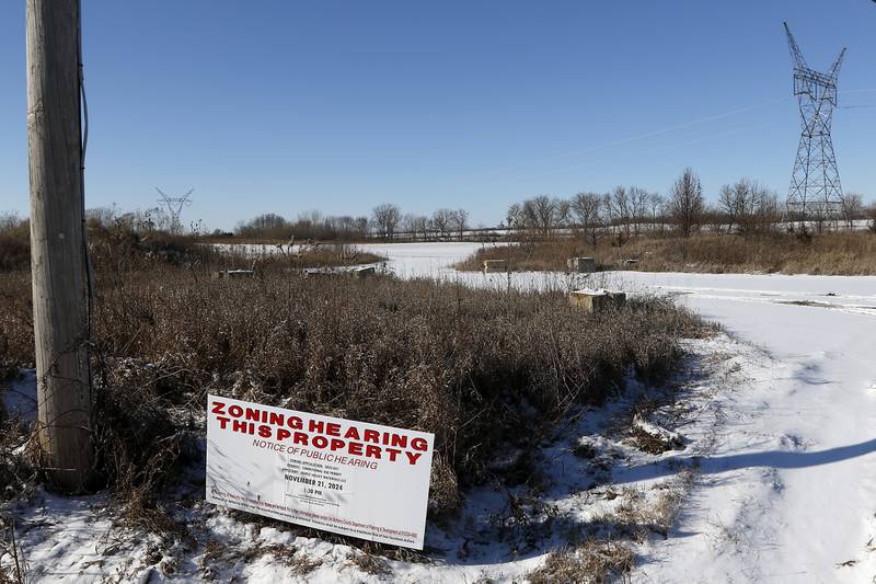 McHenry County officials are reviewing a proposal to renew a conditional use permit for Maple Valley Materials to operate a gravel pit and a ready mix facility at a farm field near Marengo.