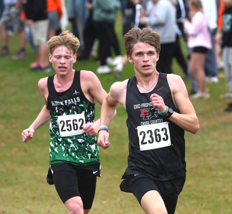 Erie-Prophetstown's Justin Wainscott and Rock Falls' Connor South sprint to the  finish line at the Amboy Columbus Day Cross Country Invitational held at Shady Oaks Country Club near Amboy on Monday, Oct. 13, 2025. They finished 40th and 41st.