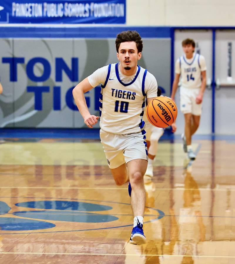 Princeton's Gavin Lanham brings the ball upcourt in Tuesday's game at Prouty Gym. The Rockets won 61-58.