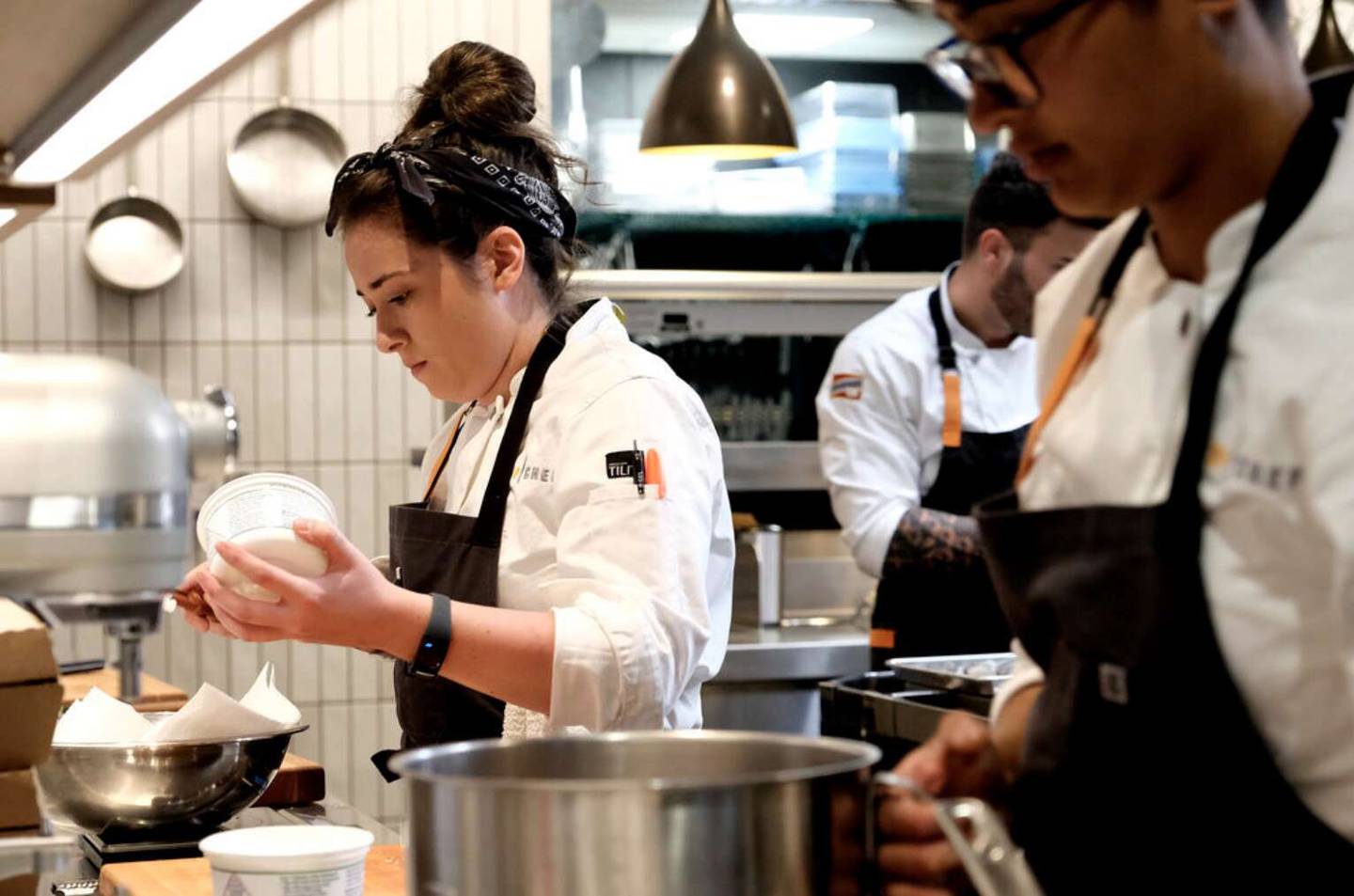 Chef Alisha Elenz, left, competes on Bravo’s “Top Chef.”