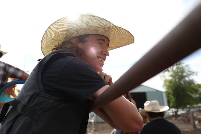 Dominic Dubberstine-Ellerbrock waits for his turn to ride a bull during practice at Rugged Cross Cattle Company. Dominic will be competing in the 2022 National High School Finals Rodeo Bull Riding event on July 17th through the 23rd in Wyoming. Thursday, June 30, 2022 in Grand Ridge.