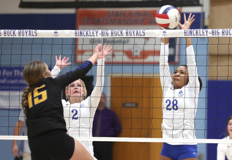 Hinckley-Big Rock's Janelle Mahaffey blocks the spike of Somonauk's Josie Rader during their match Thursday, Sept. 15, 2022, at Hinckley-Big Rock High School.