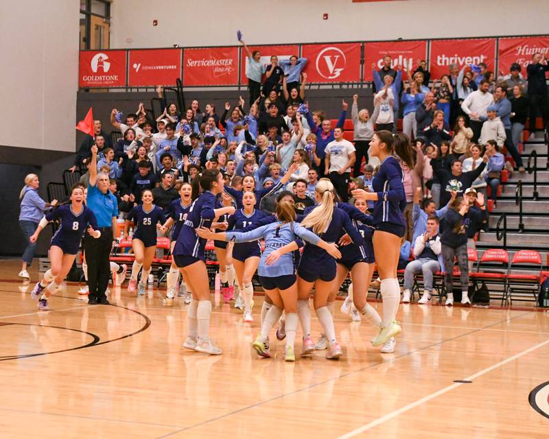 Nazareth Academy celebrates their final point sectional title victory over Geneva in 3 games on Thursday Nov. 6, 2025, held at Timothy Christian High School.
