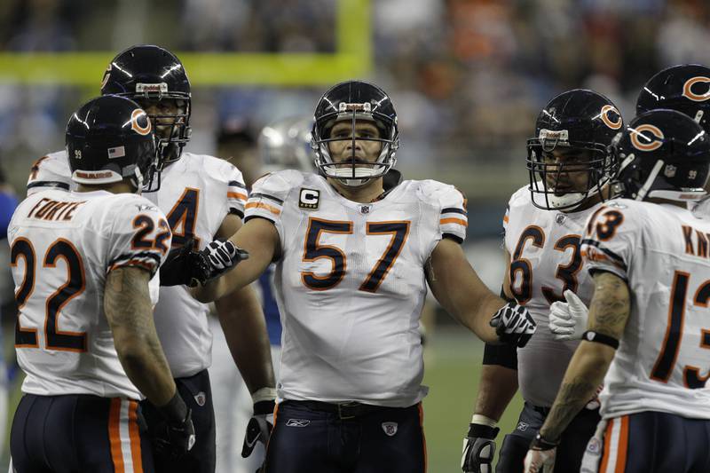 Former Chicago Bears center Olin Kreutz talks with his teammates during a game against the Detroit Lions on Sunday, Dec. 5, 2010 in Detroit.