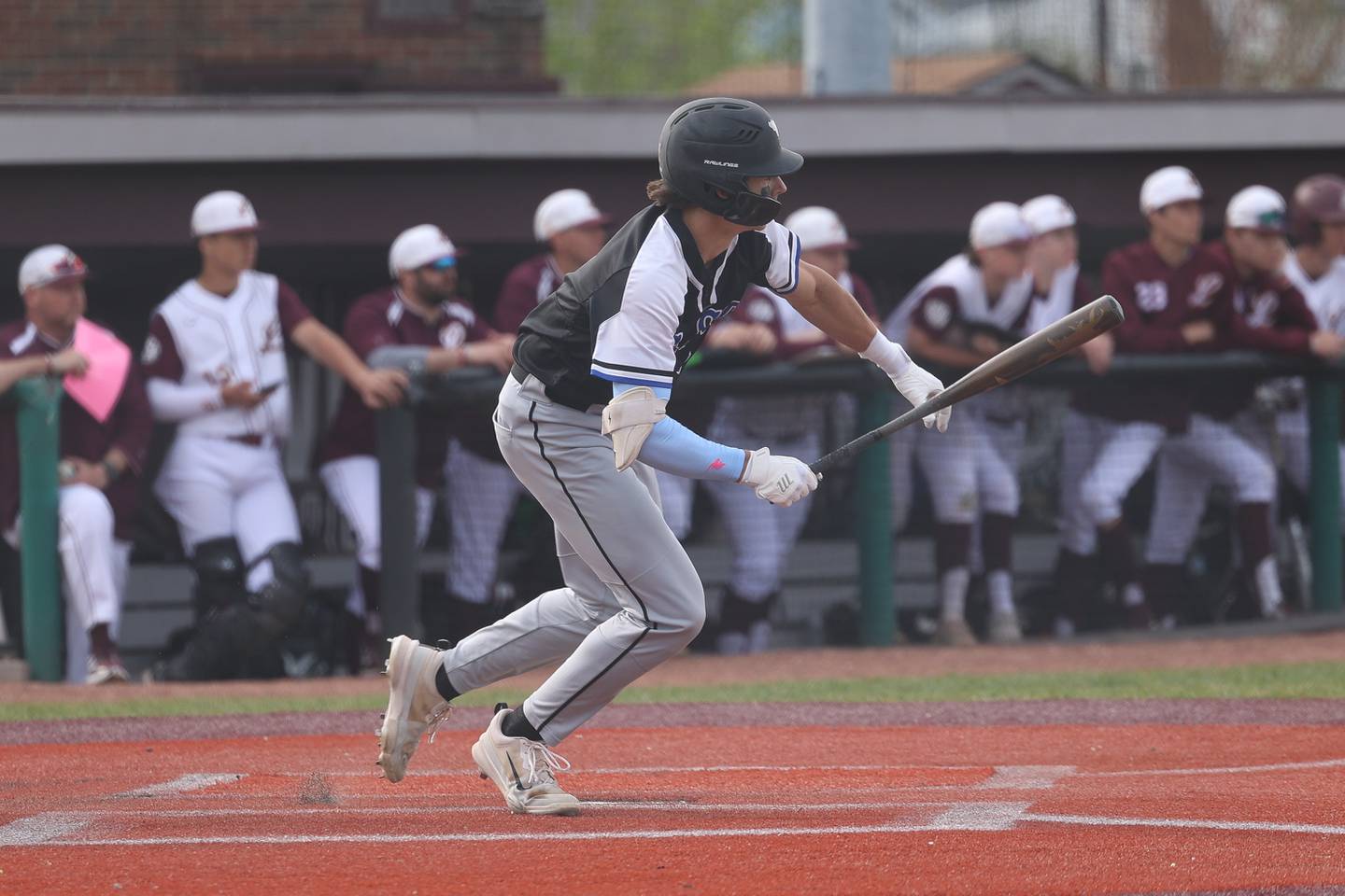 Lincoln-Way East’s Tyler Bell connects for a RBI single against Lockport on Monday, April 22, 2024 in Lockport.