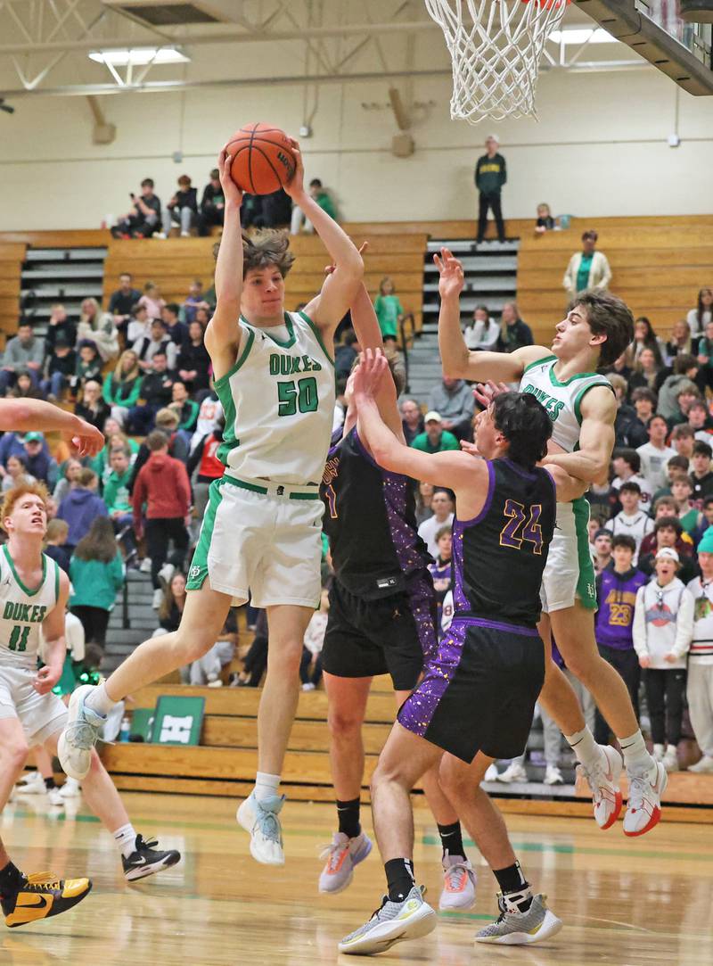 York’s Hunter Steponich (50) grabs a rebound against Downers Grove North during a boys varsity basketball game on Saturday, Feb. 10, 2024 in Elmhurst, IL.