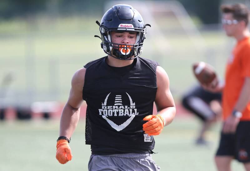 DeKalb linebacker Daniel Roman-Johnson runs through a drill during practice Monday, Aug. 7, 2023, at DeKalb High School.