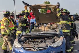 Oswego firefighters show emergency response skills at National Night Out