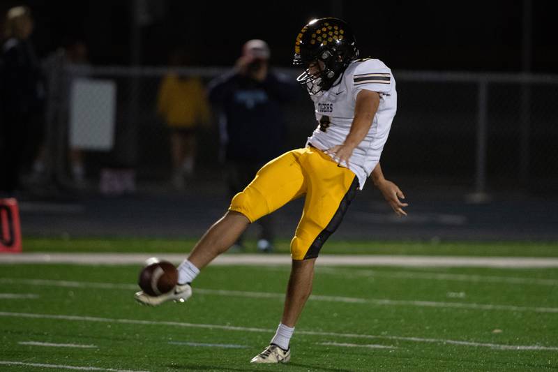 Joliet West's Adrian Ramirez punts during a game against Plainfield South Friday Oct. 4, 2024 at Plainfield South High School