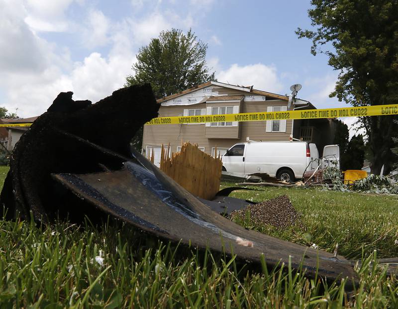 A damaged apartment building in Huntley on Thursday, July 13, 2023, after a confirmed tornado took the roof off the building in Huntley on Wednesday.