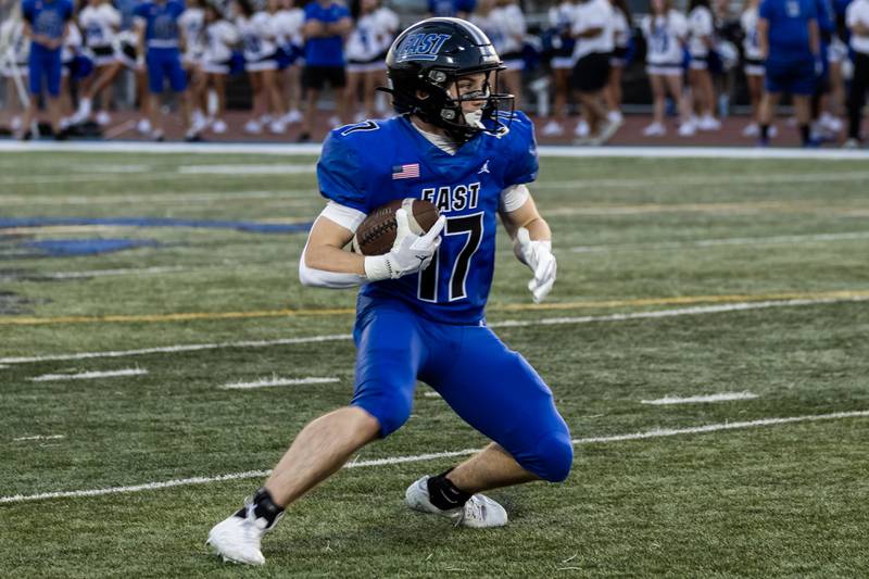 Lincoln-Way East's Jack Murphy looks for a path during a varsity football game against Metea Valley at Lincoln-Way East on Oct. 3, 2025.