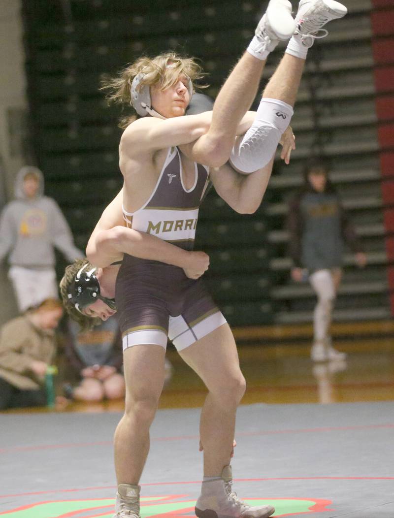 Morris's Andrew Paull wrestles L-P's Zach Pocivasek on Thursday, Jan. 11 2024 in  Sellett Gymnasium.