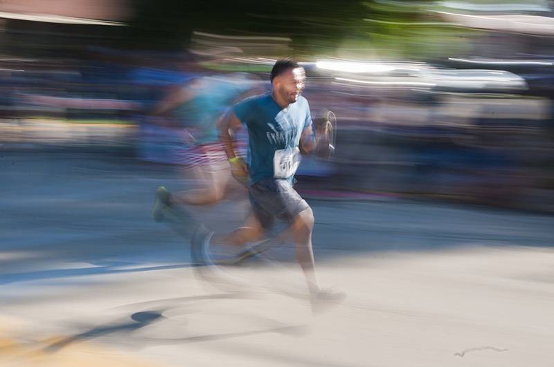 Runners race for the finish line at Haymarket Square Saturday, July 2, 2022 in Dixon.