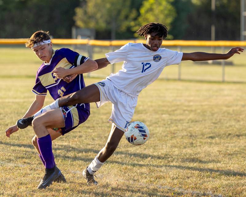 Nolan Muffler (21) of Serena’s leg is tied up with Jackson Brockway (12) of Somonauk/Leland/Newark’s leg as he trips in pursuit of ball on Monday, Sept. 29, 2025, at Serena High School in Serena.