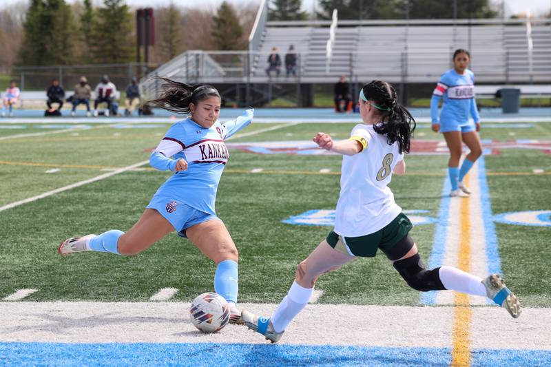 Kankakee's Stacy Calva and Bishop McNamara's Isabelle Kuntz both stride out for the ball during the Kays' 8-0 victory in the final All-City match on Saturday, April 11, 2026.
