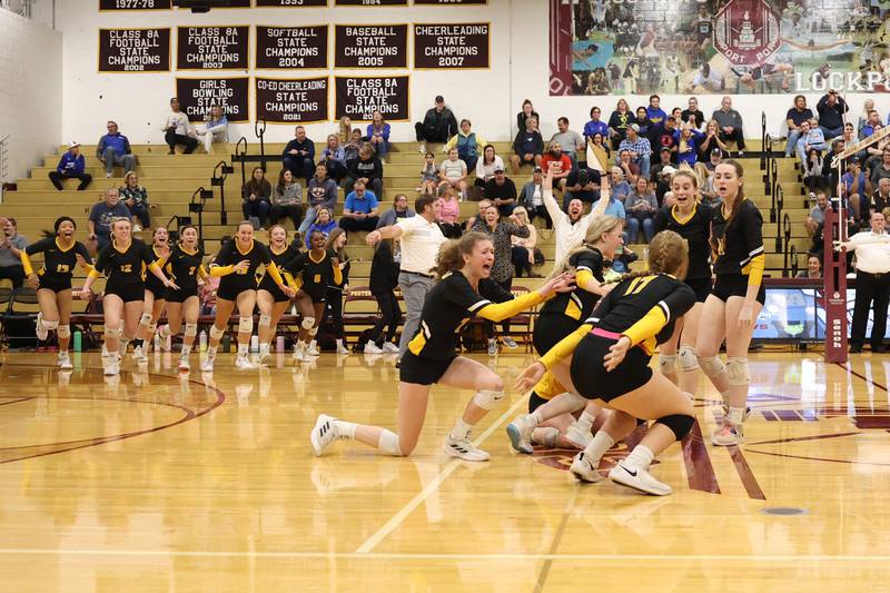 Joliet West celebrates match point against Sandburg in the in the Class 4A Lockport Sectional title match on Wednesday.