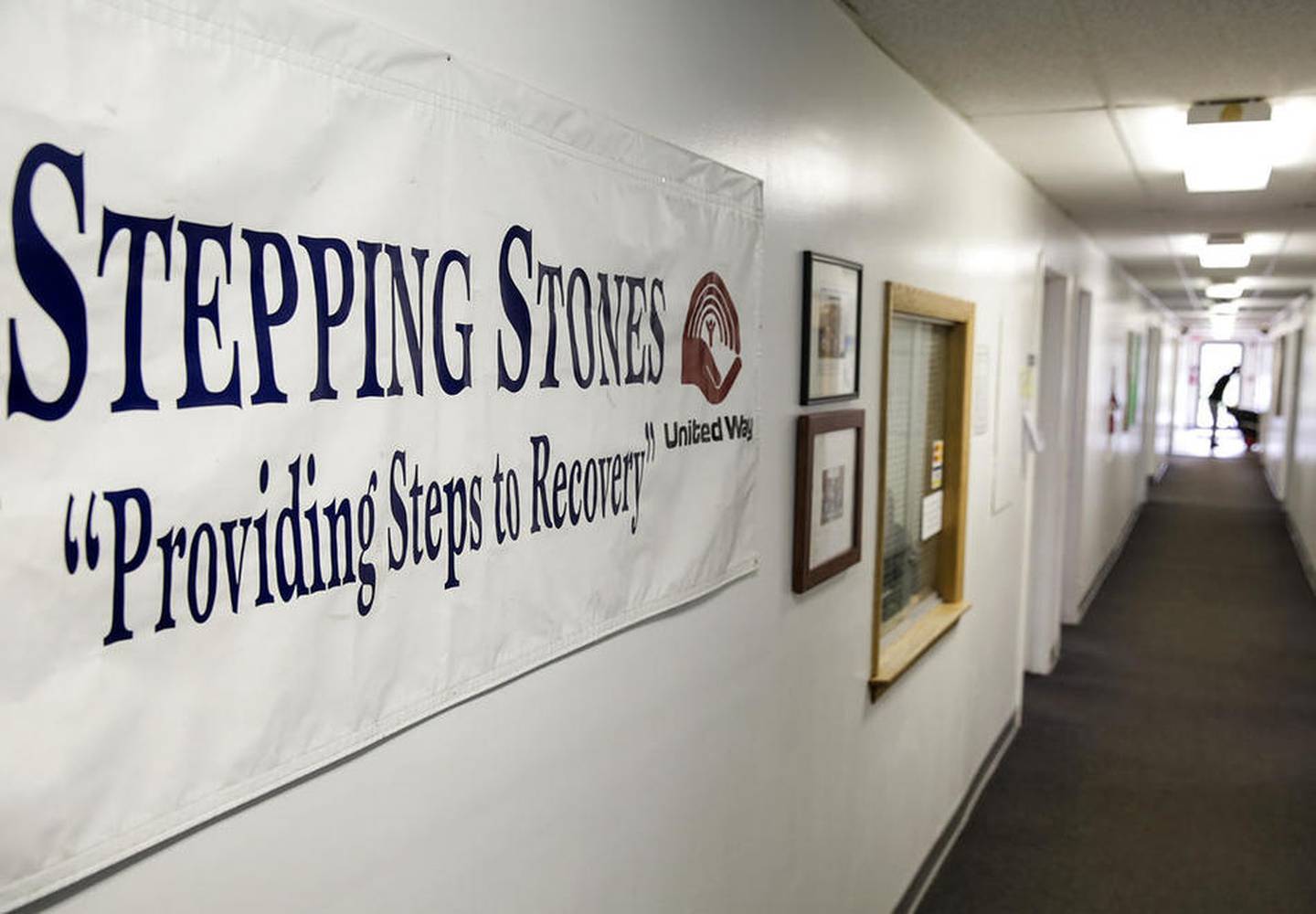 A "Stepping Stones" banner hangs March 25 near the lobby of the Stepping Stones facility in Joliet.