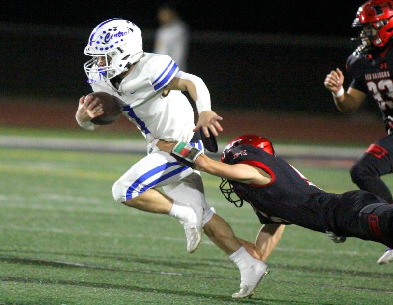 Burlington Central’s Zane Pollack runs the ball in varsity football at Huntley High School in Huntley on Friday, Oct. 25, 2024.